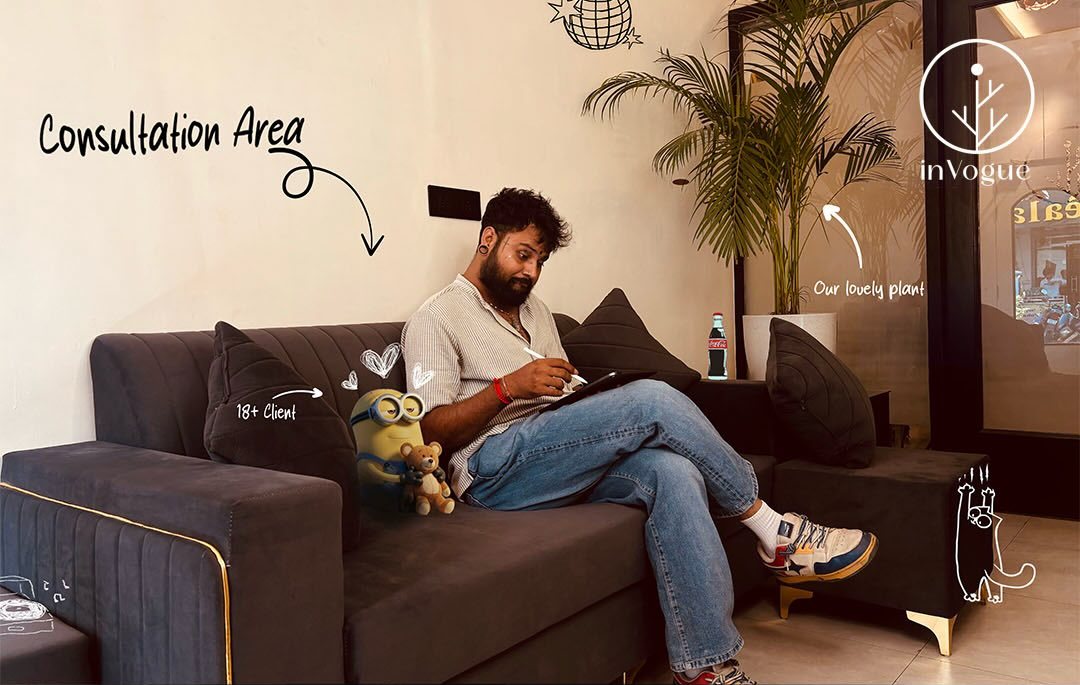 Consultation couch at inVogue — client sketching beside the plants