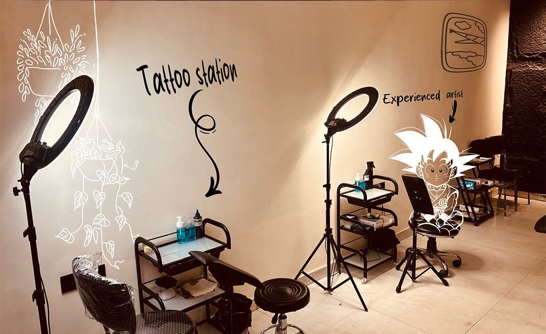 Tattoo stations with ring lights, set up fresh for every client